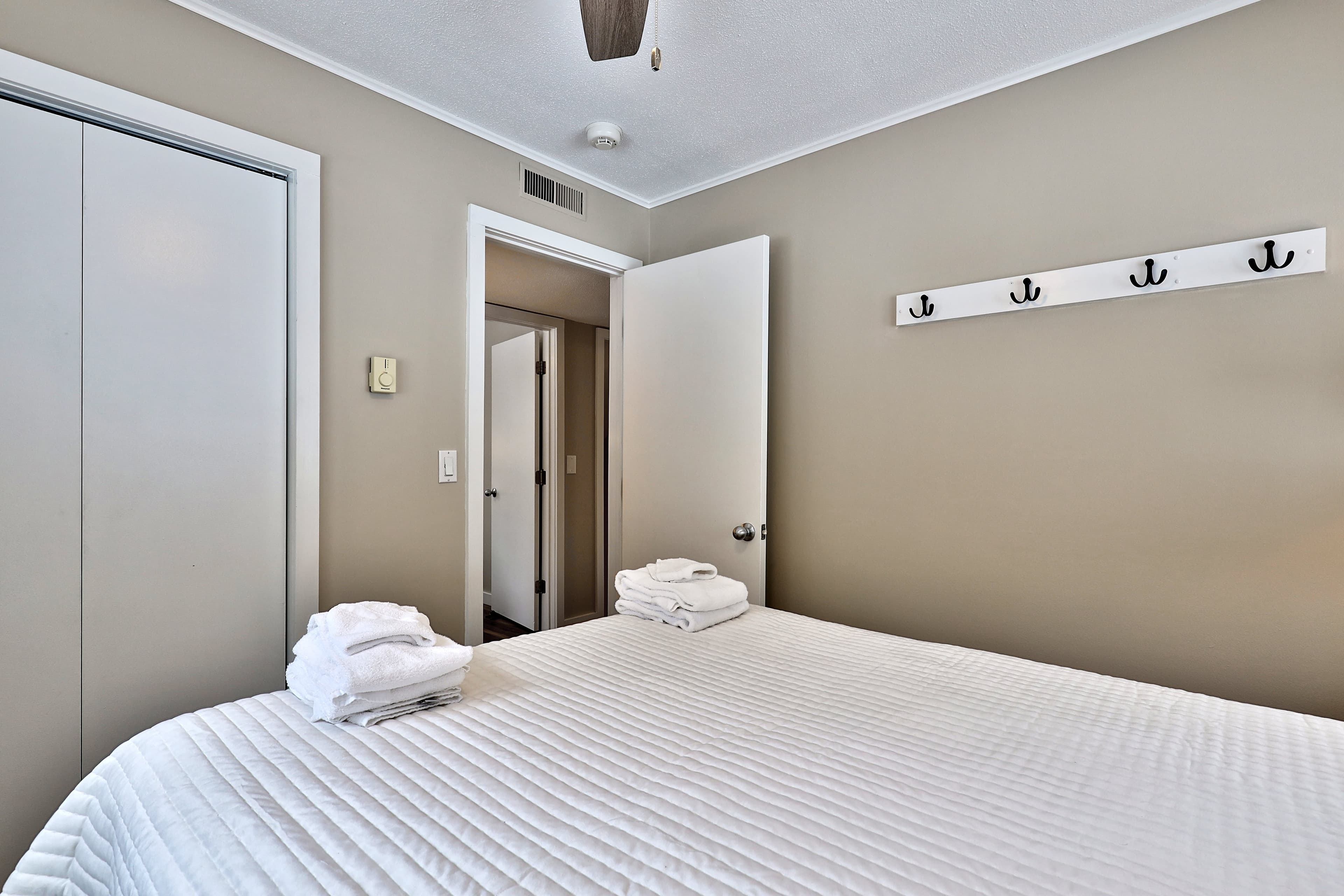 Queen bedroom.  Hooks and a closet provides plenty of storage space.