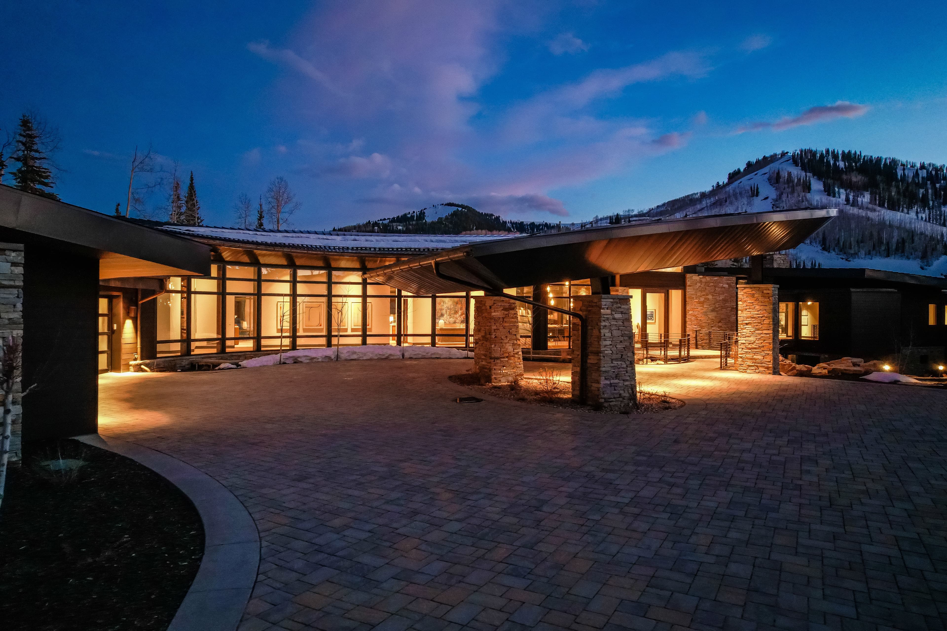 An exterior night view of our Alpine Opus at the Colony rental.