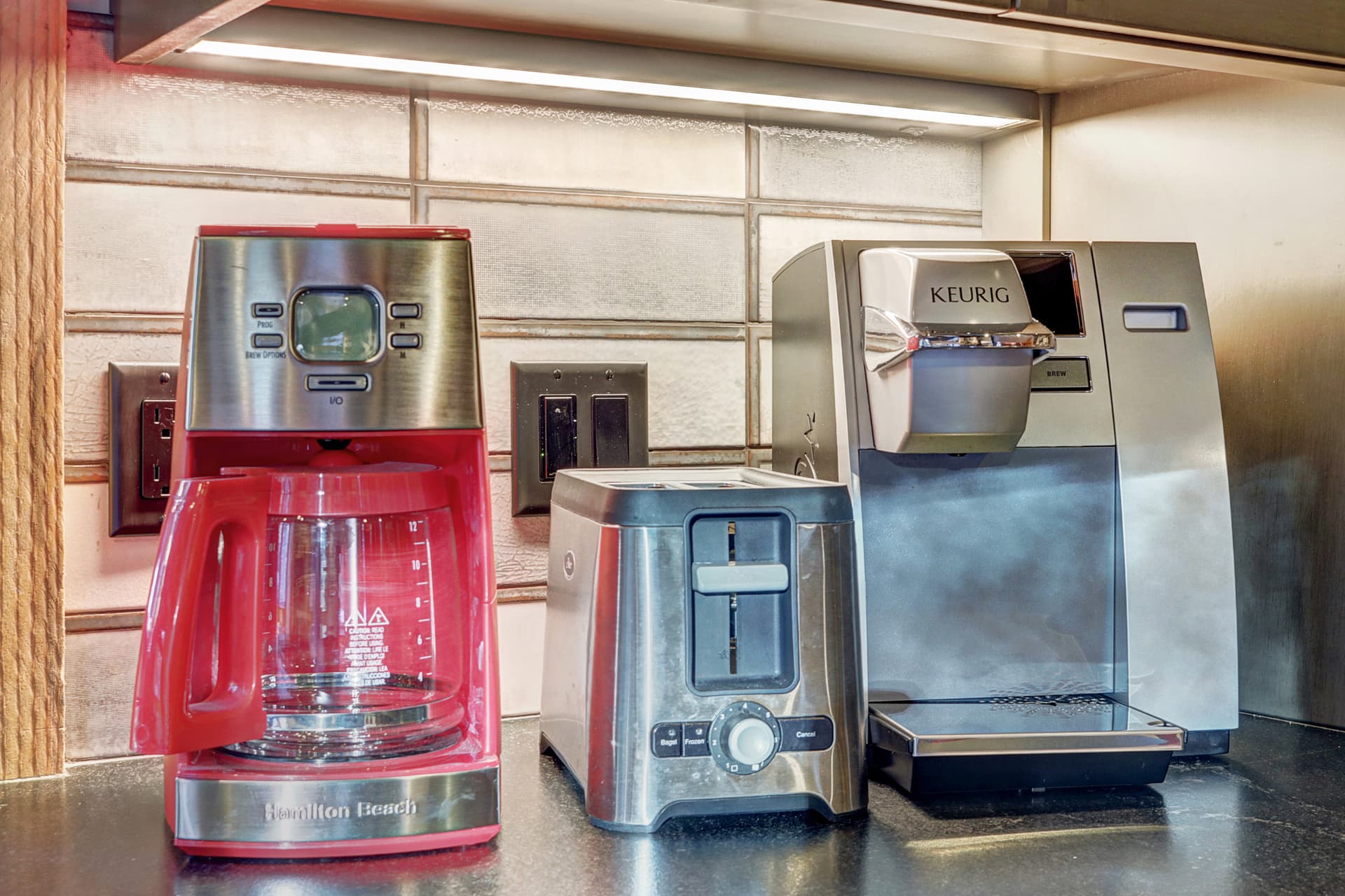 Small appliances include 12 cup coffee pot, toaster, blender, and slow cooker - Arrow Darrow Breckenridge Vacation Rental