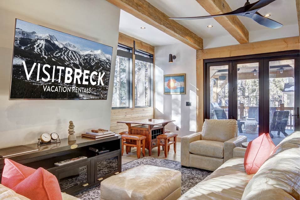 Additional view of living area and open kitchen on main level - Arrow Darrow Breckenridge Vacation Rental