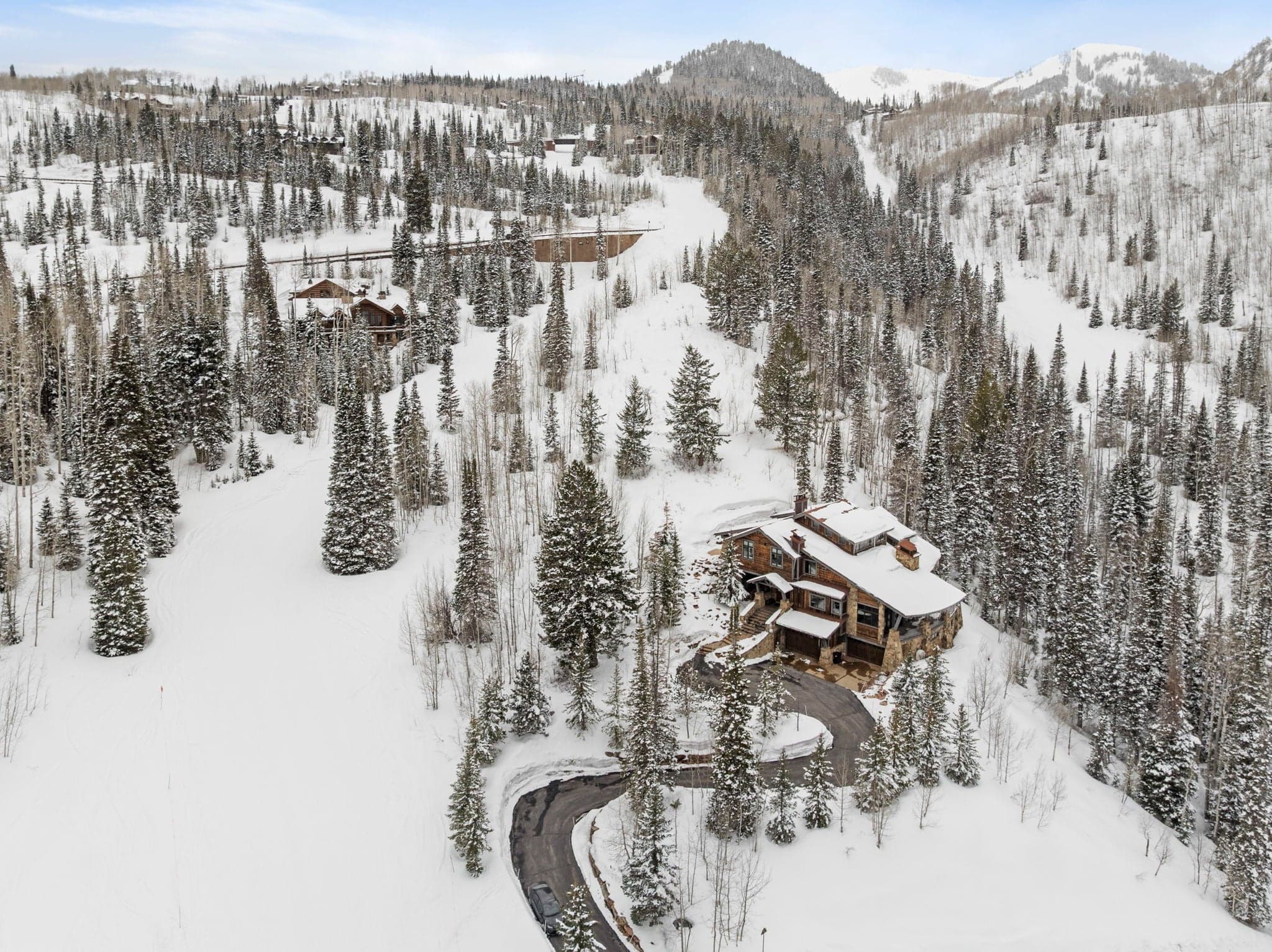 panoramic view of Silver Horse with park city ski runs surrounding the home